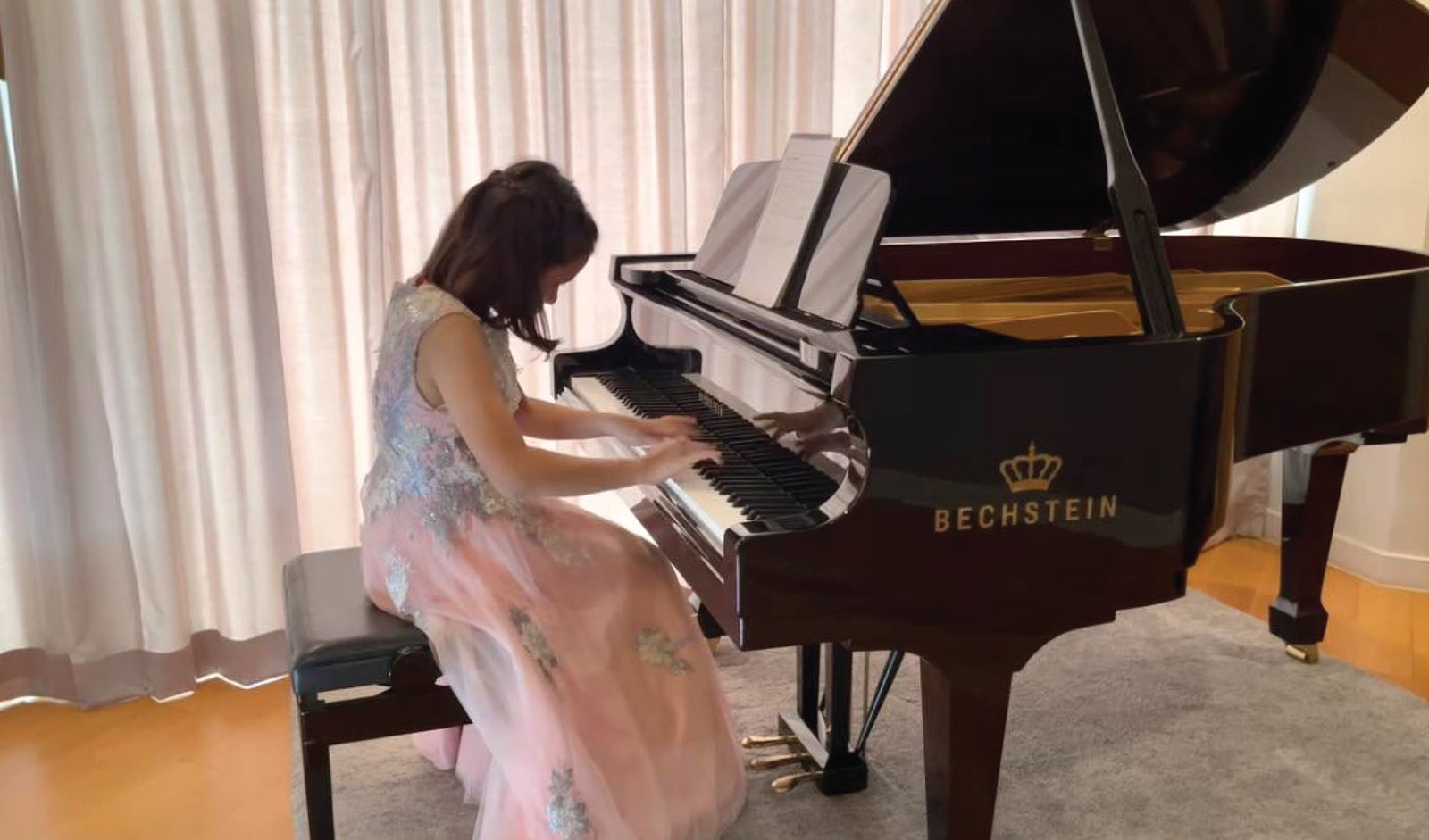 Annie playing the piano