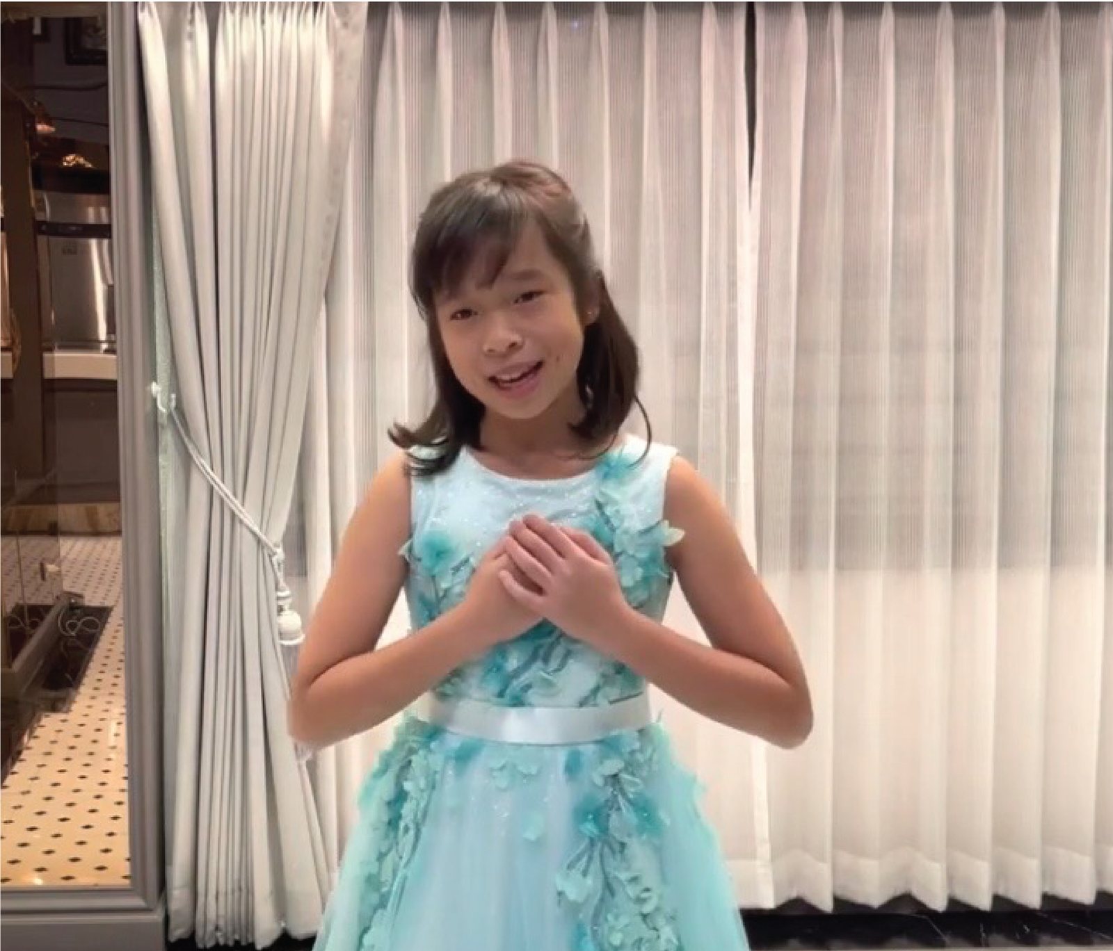Annie singing for the Virtuozo International Music Competition