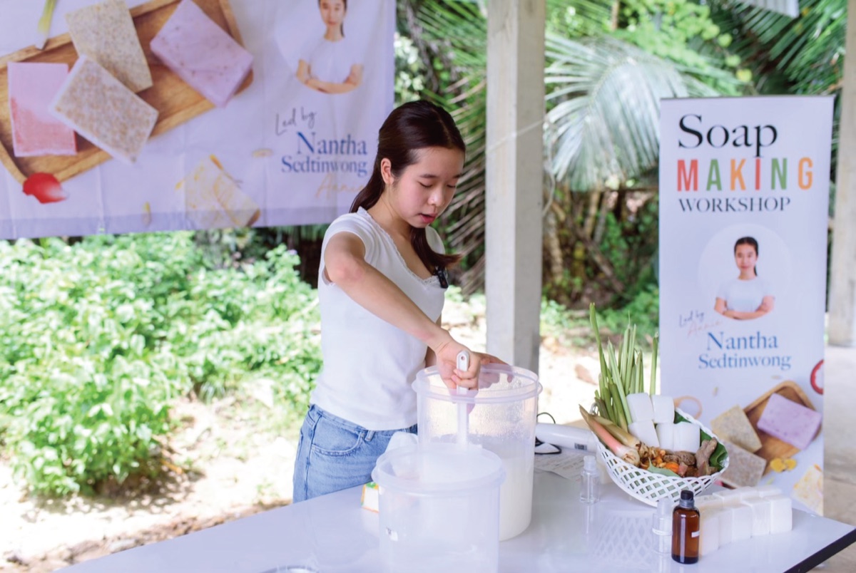 Annie demonstrating herbal soap making at the workshop table